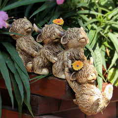 Leekung Highland Cow Figurine side view with sunflowers