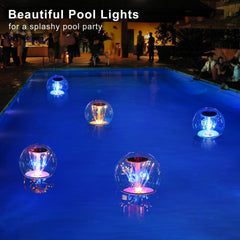 LENONE Floating Pool Light in a garden setting at night