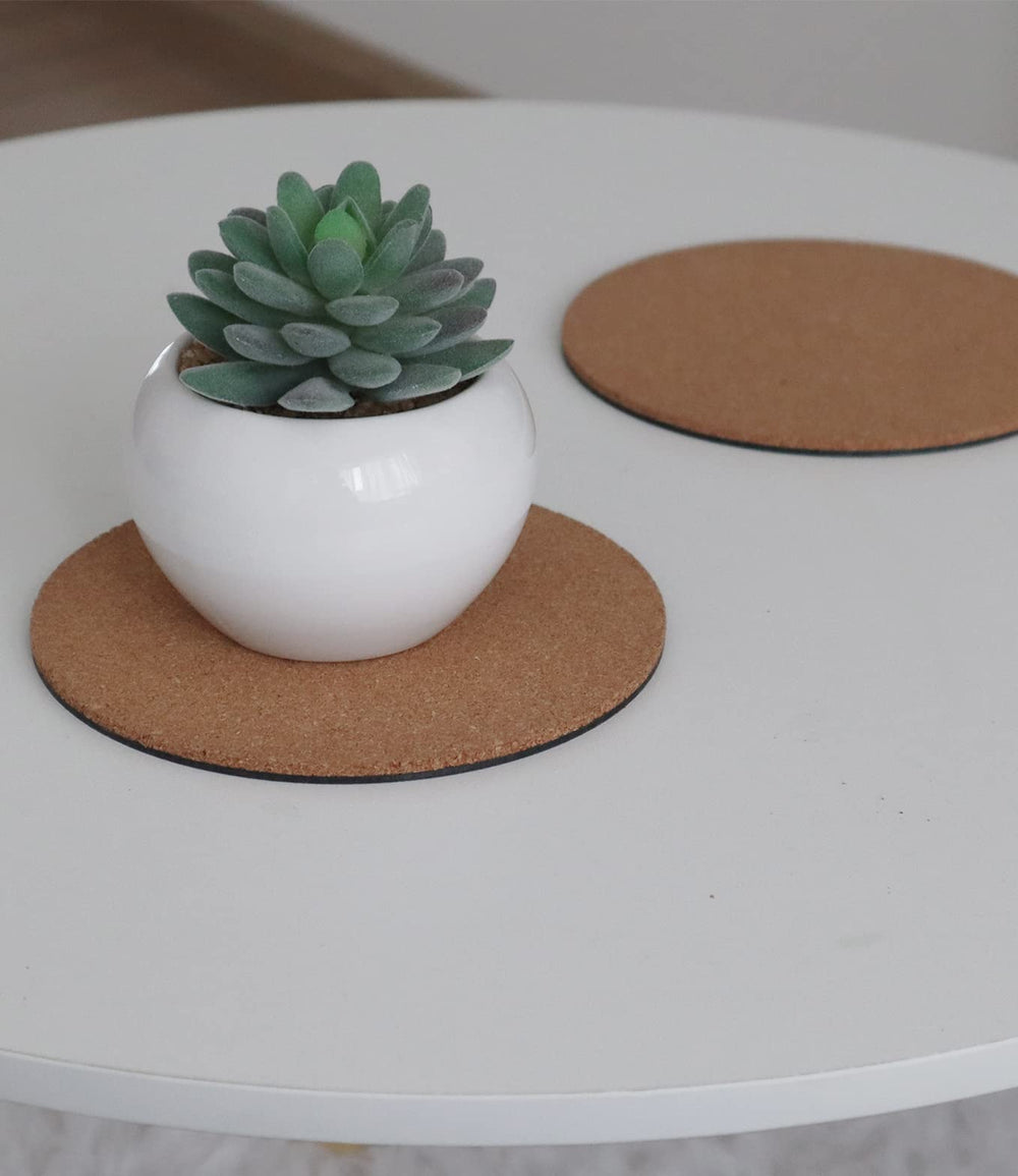 Lifestyle image of KITLAB Cork Coasters in a garden setting