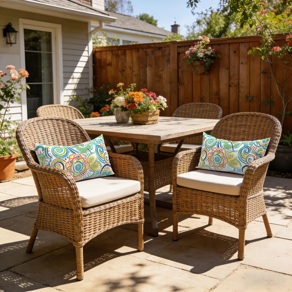 Lifestyle image of LVTXIII lumbar pillow covers on balcony furniture