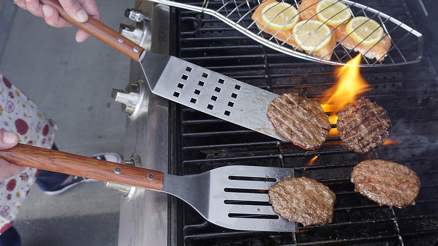 Lifestyle image of RSVP BBQ Spatula in action flipping burgers on grill