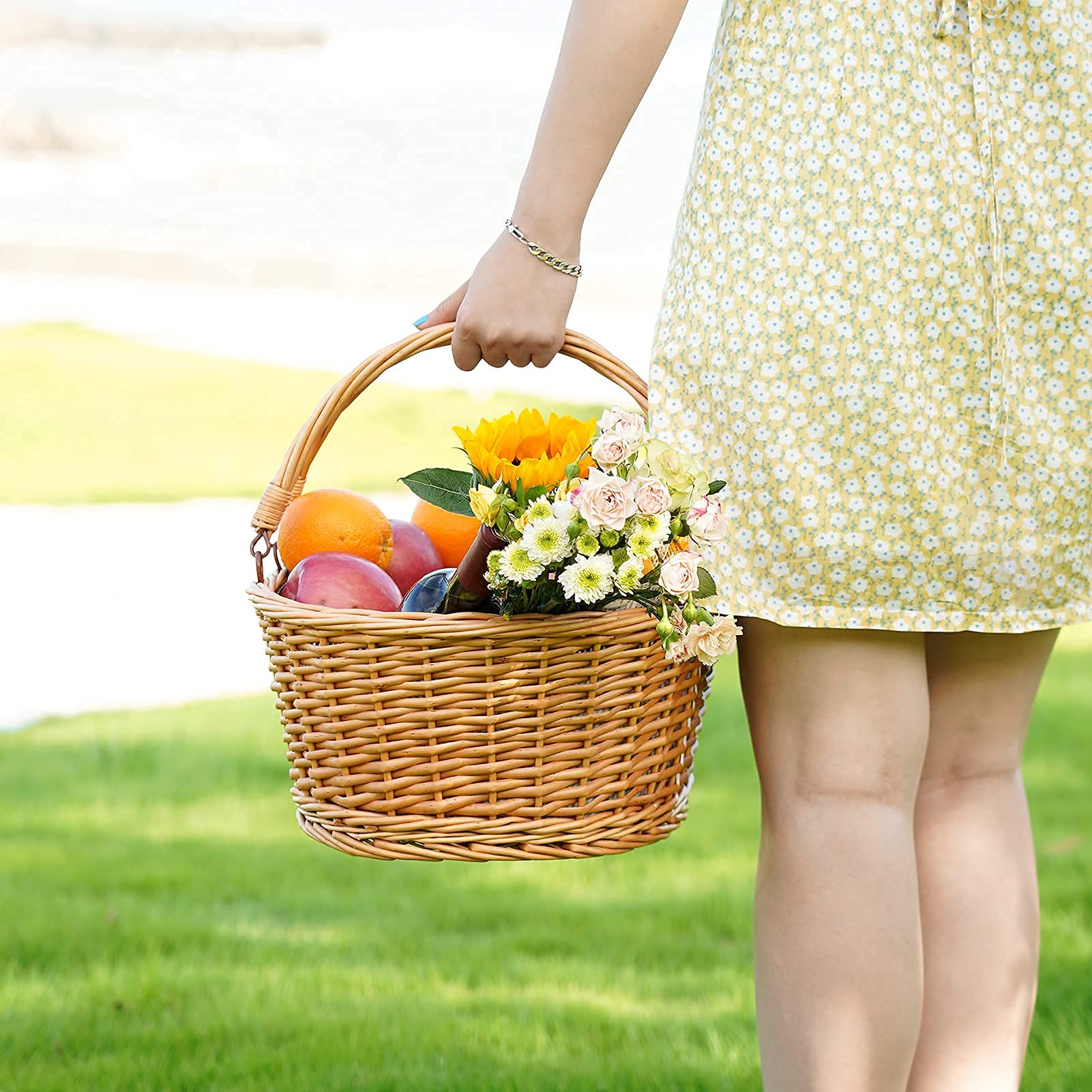 Lifestyle image of TwentyNext wicker basket at a picnic