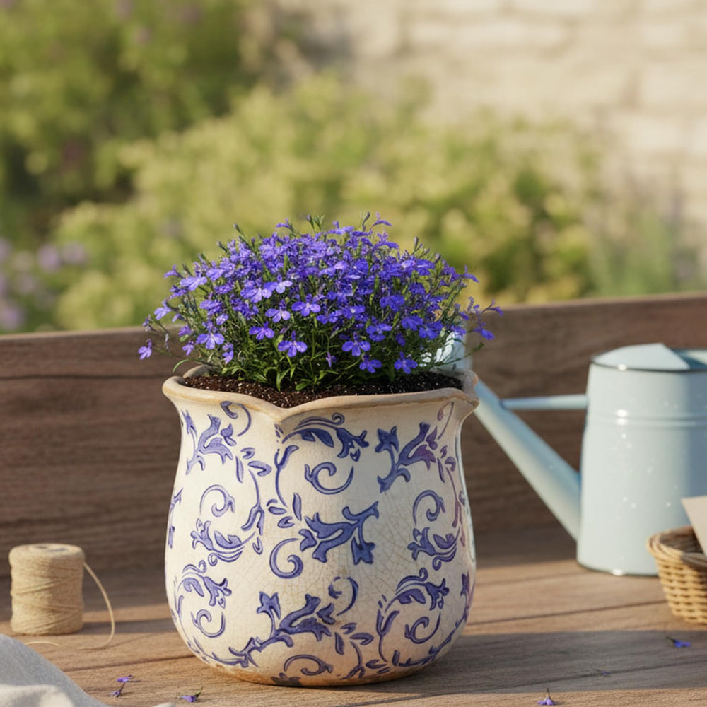 Lifestyle scene featuring Xiaan Jiaju Ceramic Planter with indoor plants