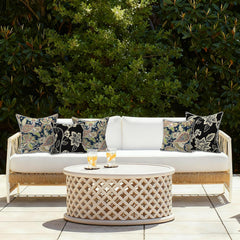 Lifestyle scene of LVTXIII Outdoor Throw Pillow Covers on patio furniture