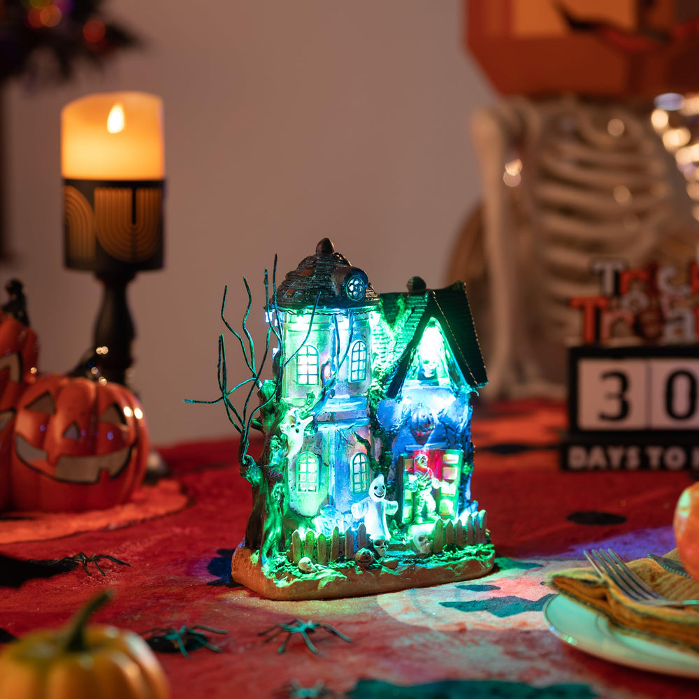 Lifestyle scene of Valery Madelyn Halloween Village House on a dining table