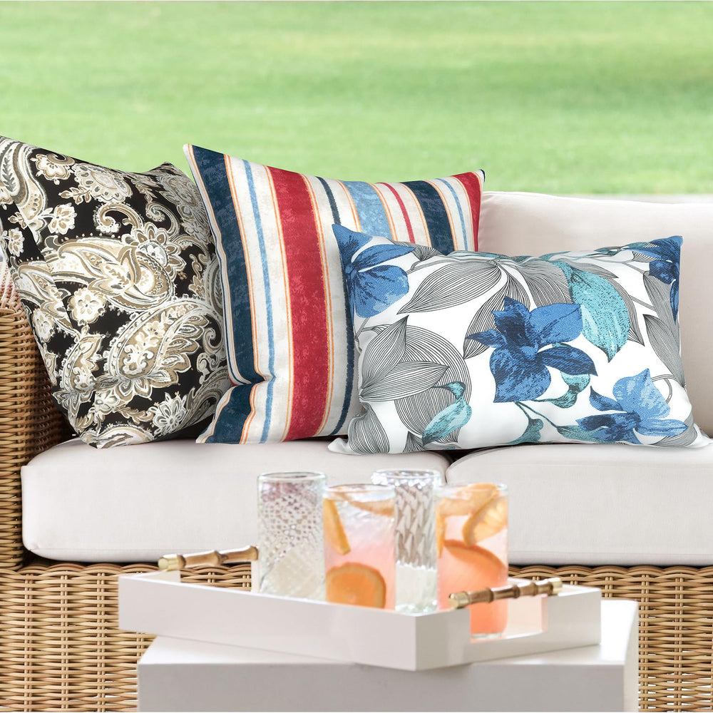 Lifestyle scene with DYTXIII Lumbar Pillow Covers in outdoor setting