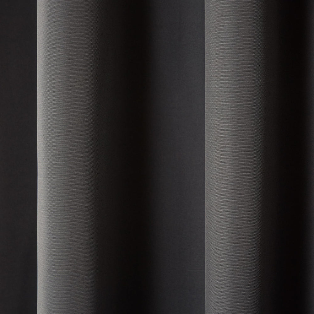 Light filtering through TOWN & COUNTRY BASICS outdoor curtains