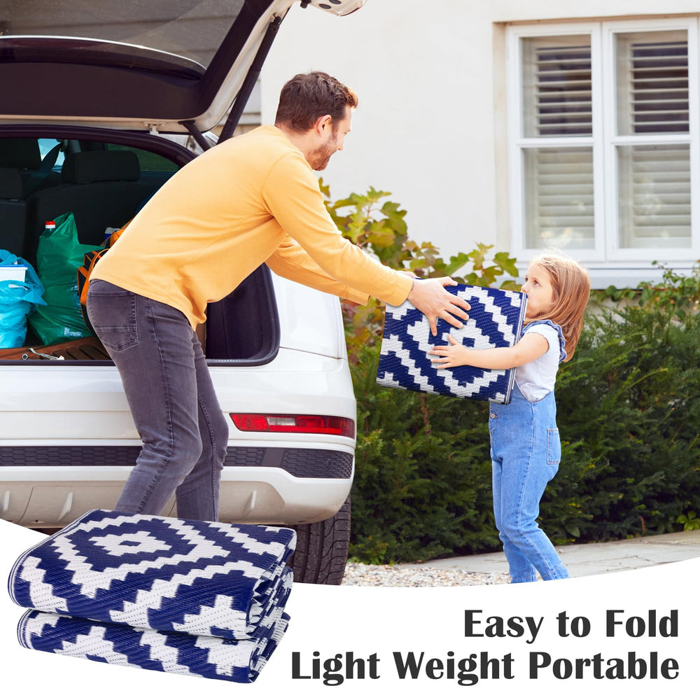 Lightweight and portable Mattitude outdoor rug folded for travel