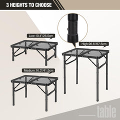 Lightweight REDCAMP folding table being carried outdoors