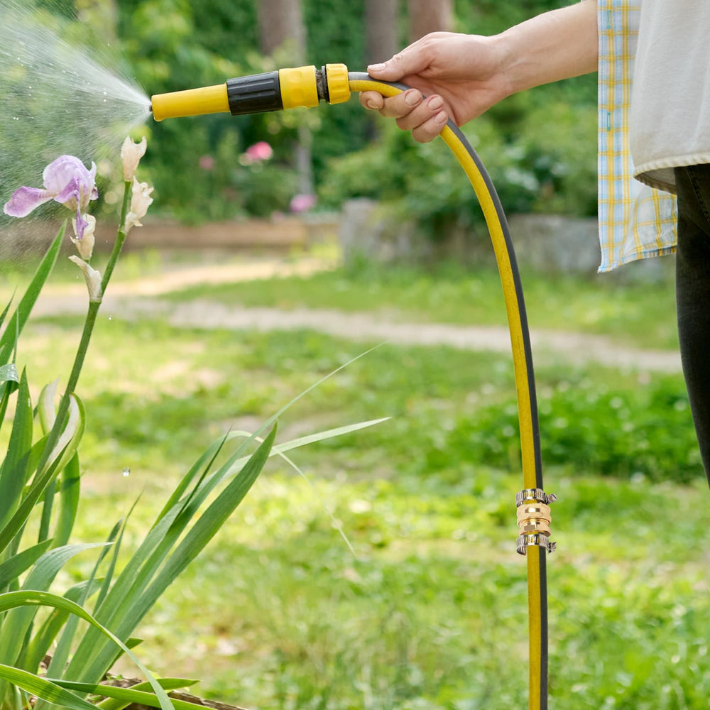 LIULO TOOL connectors in use on a garden hose outdoors