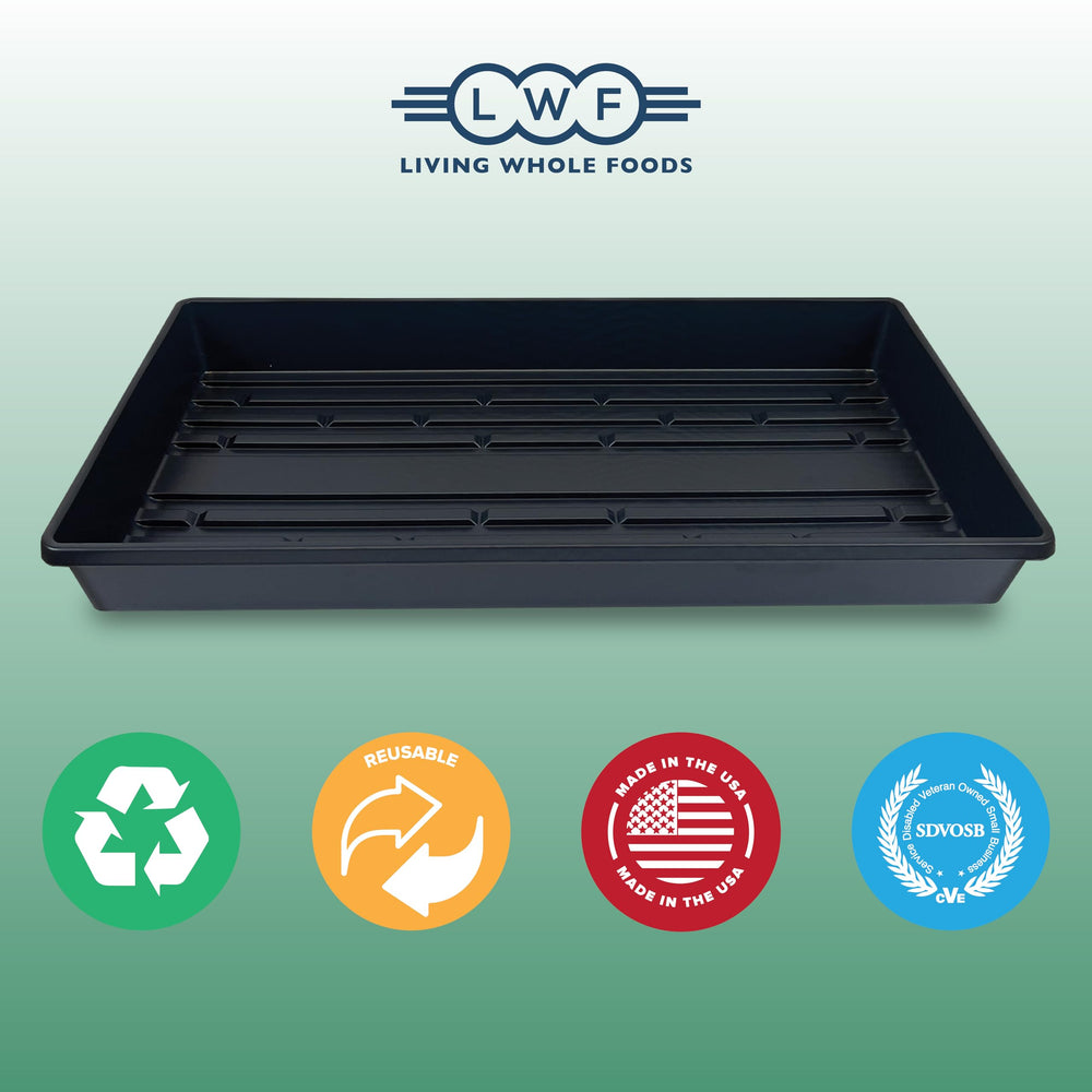Living Whole Foods plastic growing trays in a garden setup
