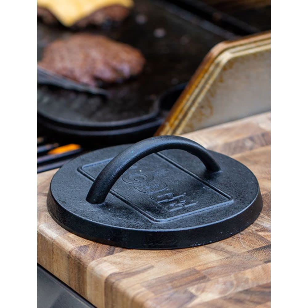 Lodge cast iron press with seasoned finish