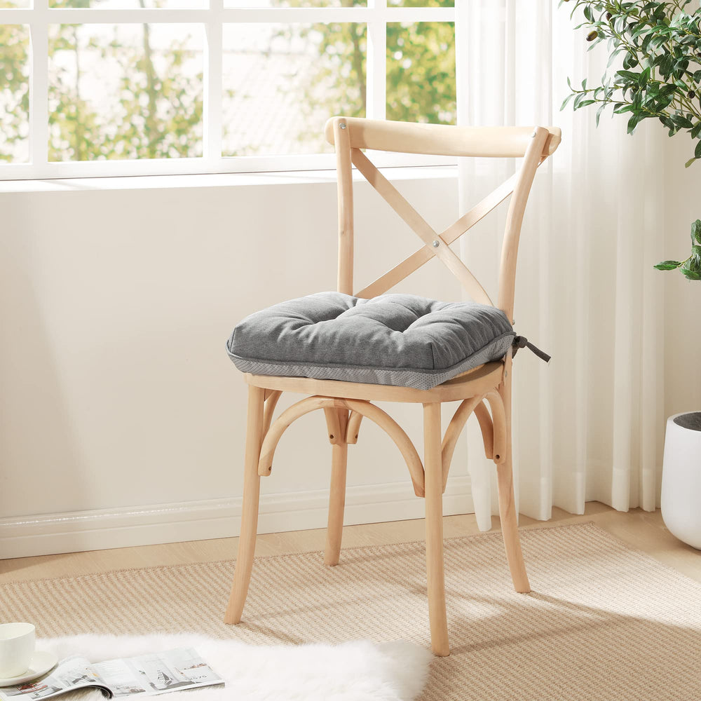 Love's cabin Memory Foam Chair Cushions arranged on a dining chair