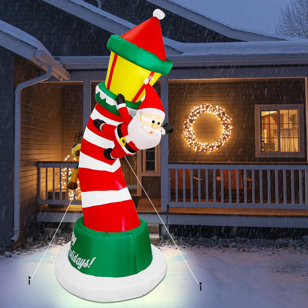 Lulu Home 9FT Christmas Inflatable Lighthouse with garden backdrop