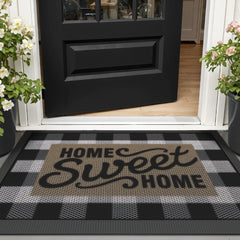 LUMI welcome mat rinsed under water for easy cleaning