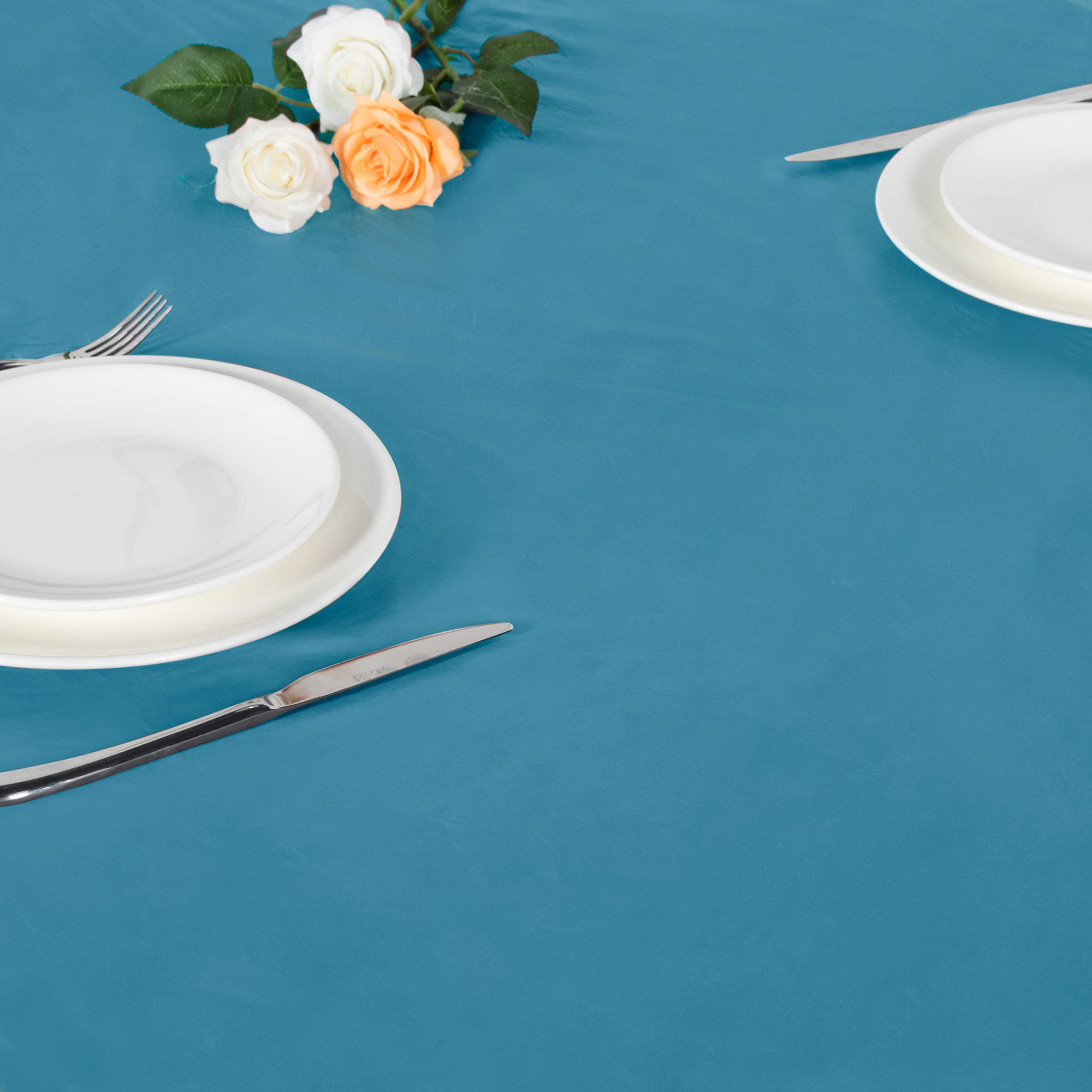 LUSHVIDA round tablecloth in a garden setting