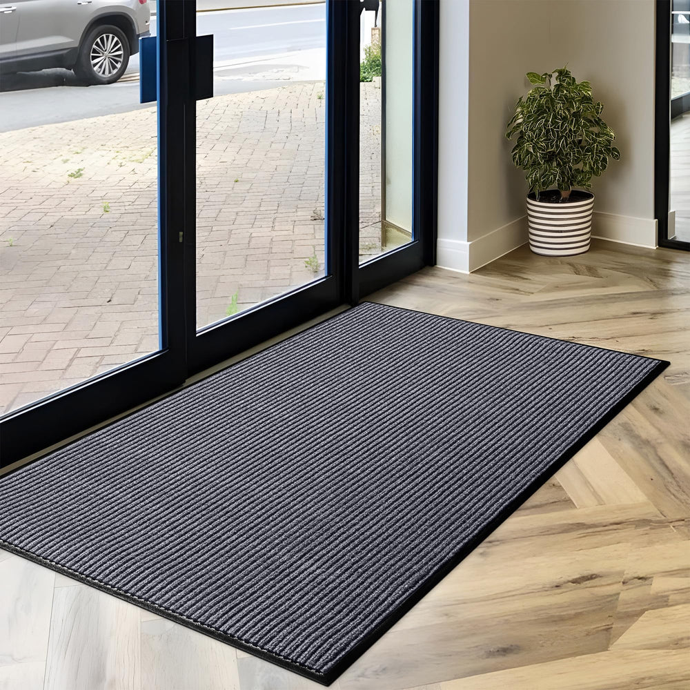 LuxUrux commercial door mat in outdoor setting on patio