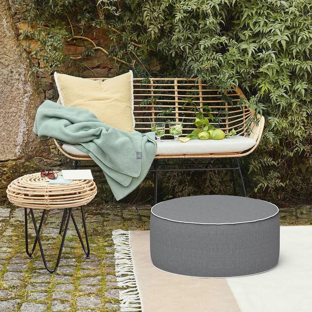 LVTXIII Inflatable Ottoman with a person resting their feet