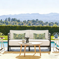 LVTXIII Outdoor Lumbar Pillow Cover on a patio chair