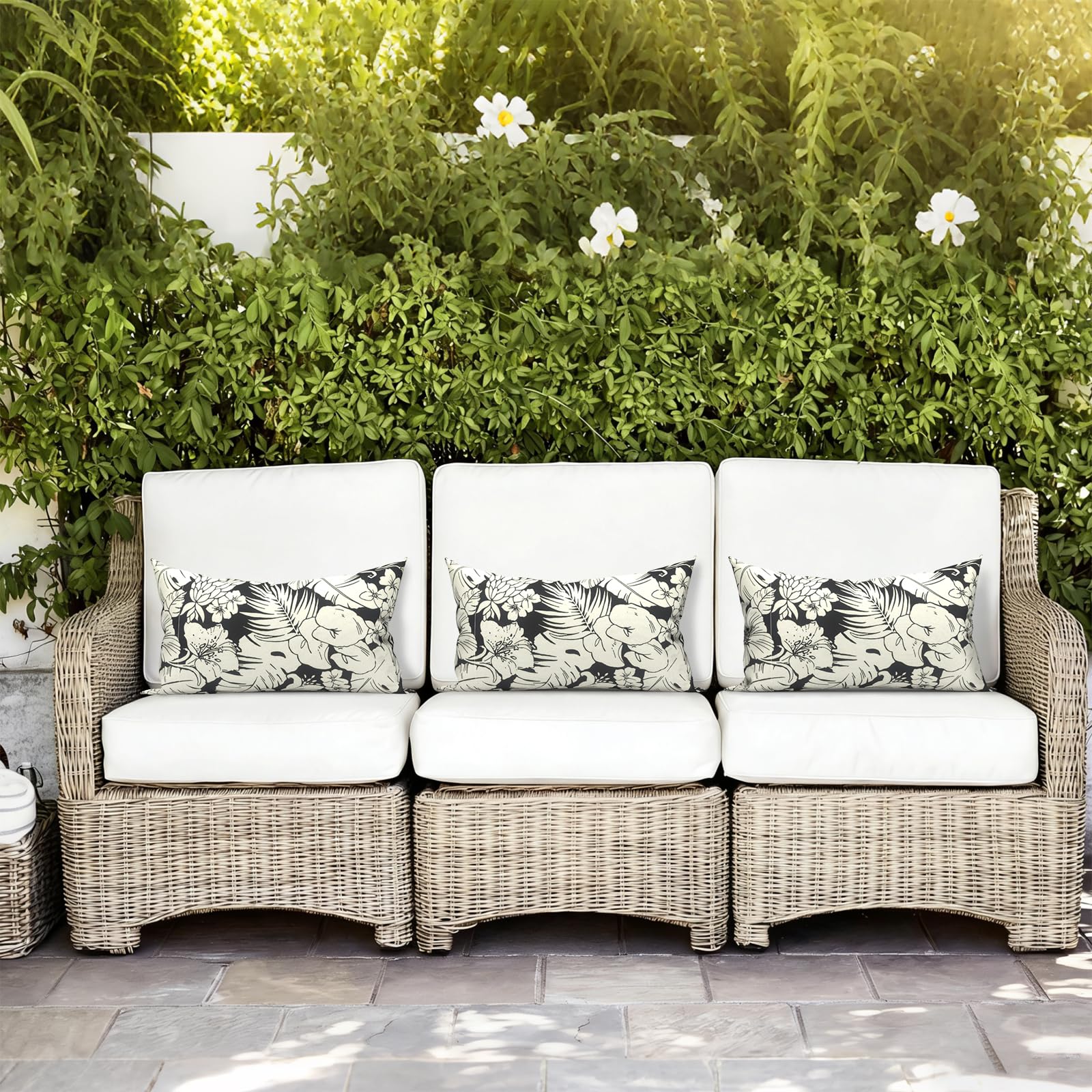 LVTXIII Outdoor Lumbar Pillows showing vibrant Tropical Blossom Noir pattern