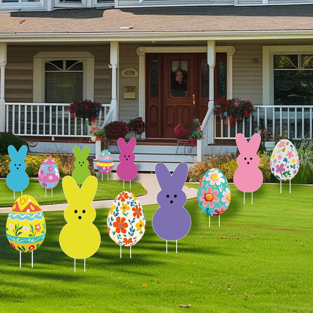 Lynumtw Easter yard signs in a garden setting