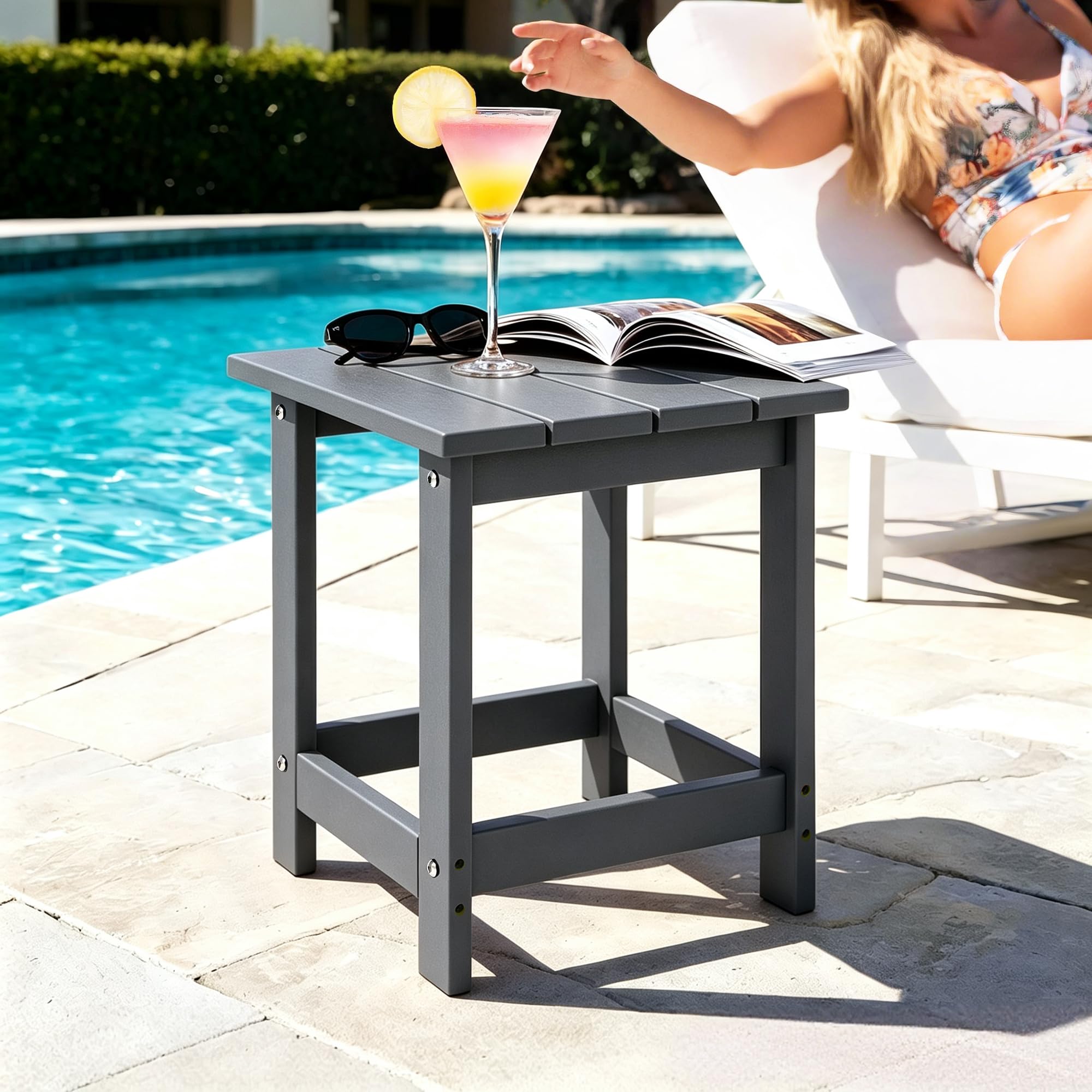 LZRS outdoor side table with drinks and flowers on it