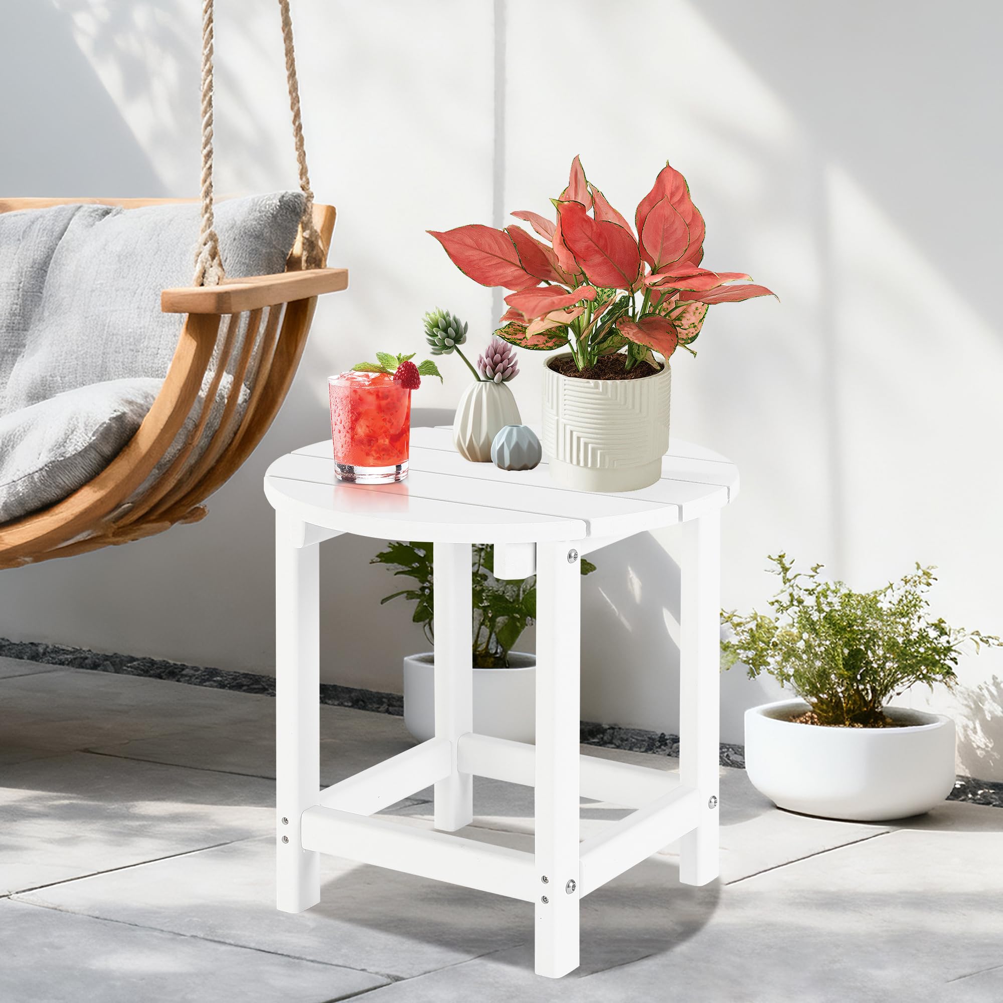 LZRS Round Adirondack Side Table in White in a garden setting