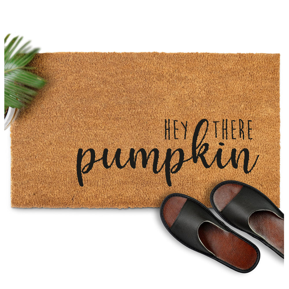 MAINEVENT Hey There Pumpkin Door Mat displayed with autumn leaves