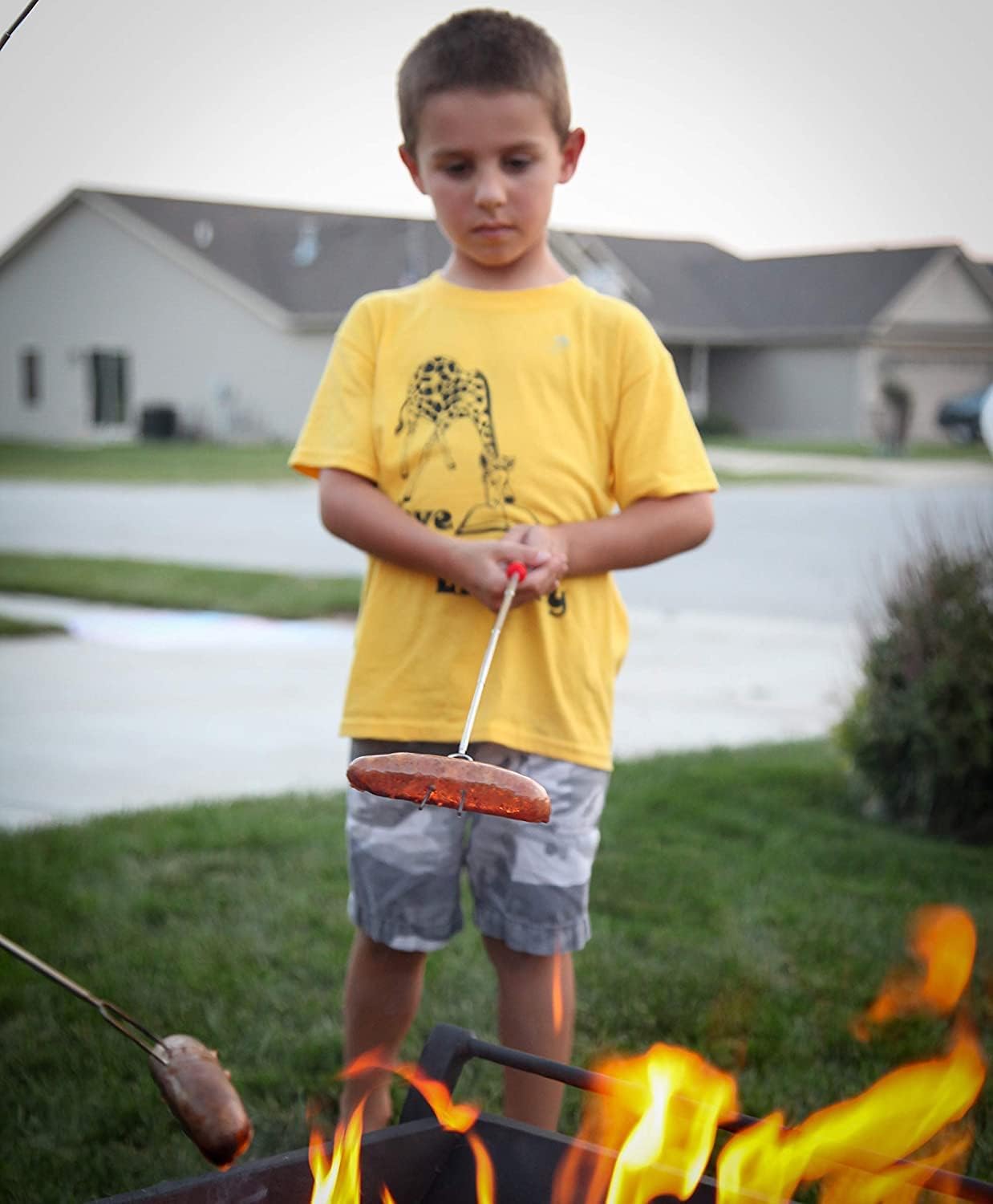 MalloMe S'mores Sticks displayed with hot dogs and marshmallows