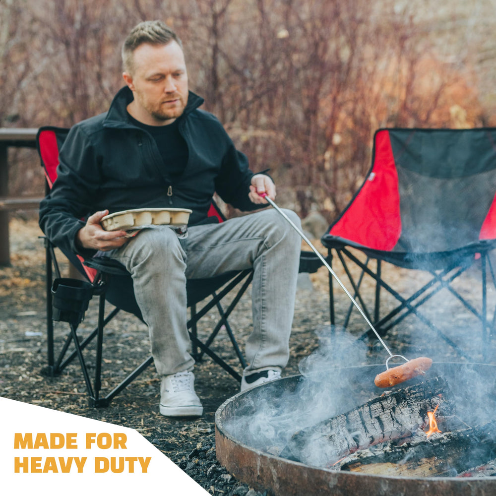 MalloMe s'mores sticks with a campfire in the background