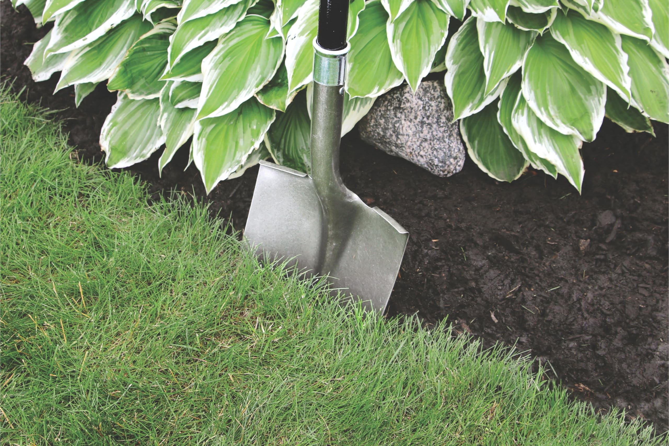 Master Mark Landscape Edging Coil installed around a garden bed