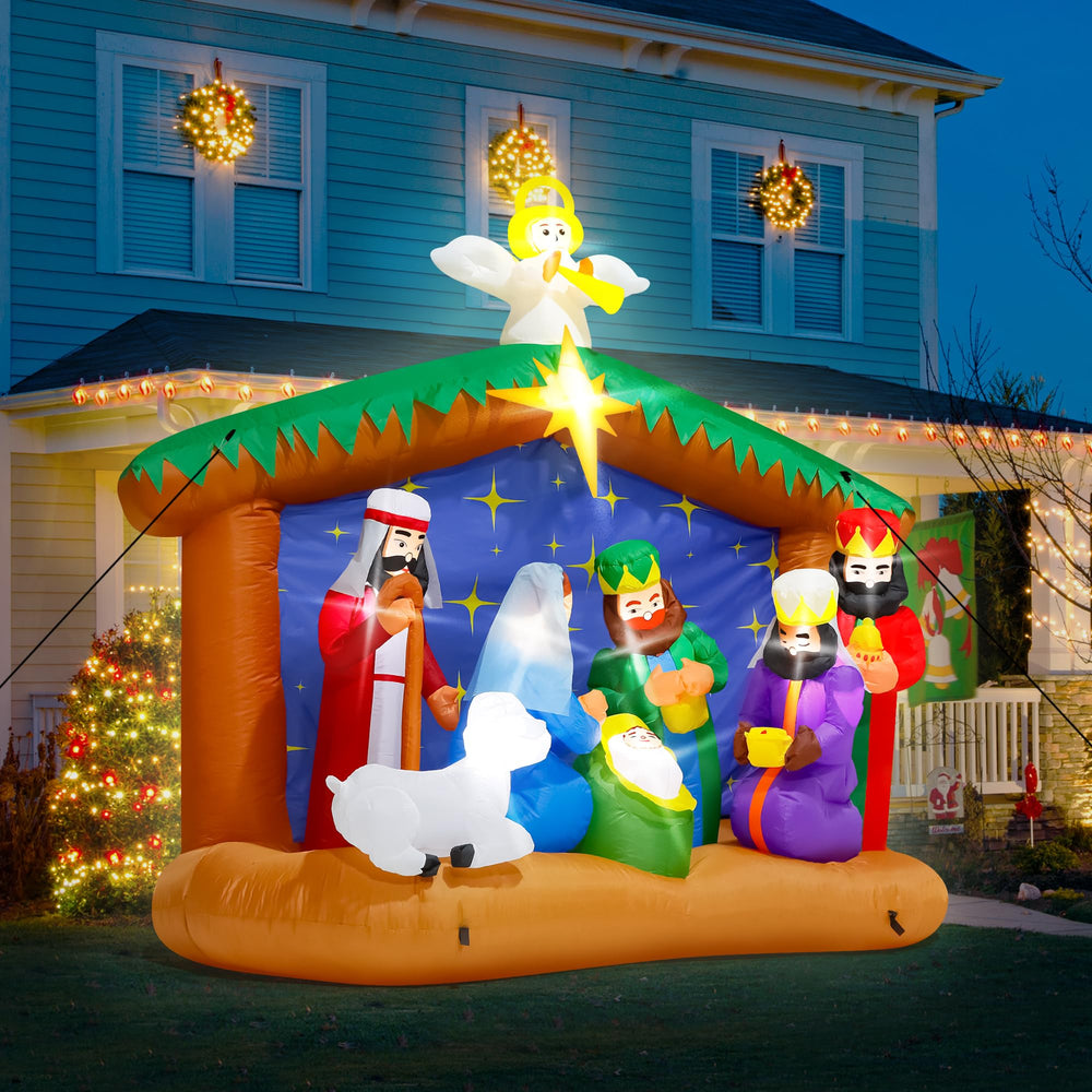 Melisheer inflatable Nativity scene lit up at night in a yard