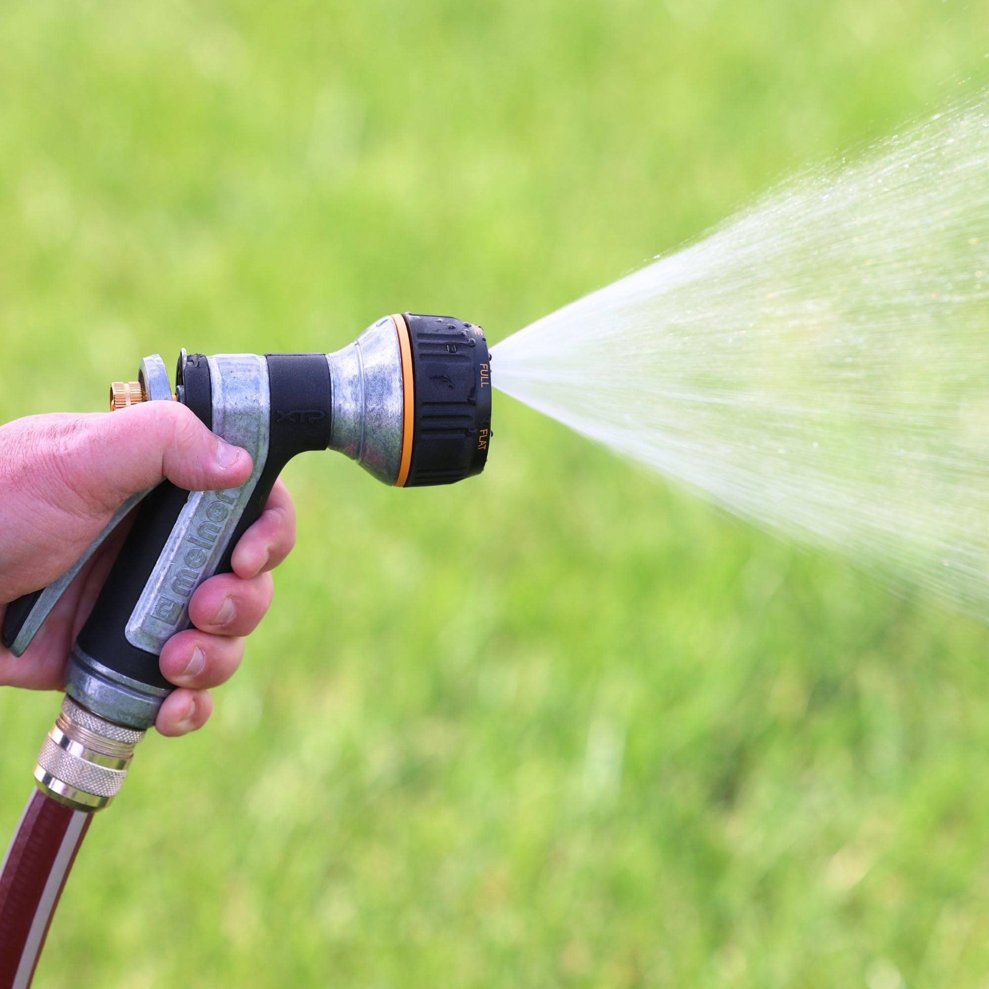 Melnor 7-Pattern Hose Nozzle demonstrating various spray patterns