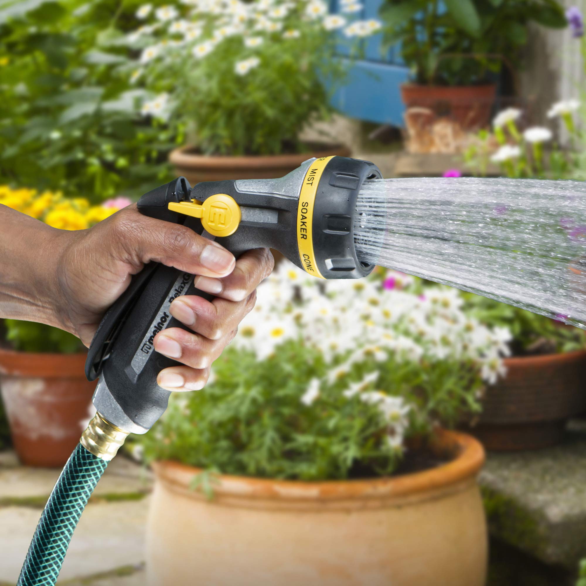 Melnor 8-Pattern Nozzle in use watering flowers