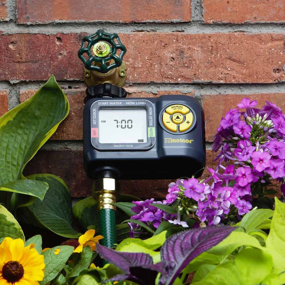 Melnor AquaTimer Digital Hose Timer side view showing manual option