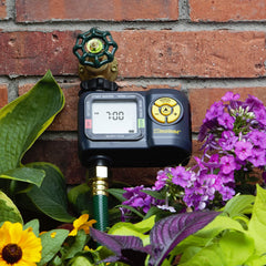 Melnor AquaTimer Digital Hose Timer side view showing manual option