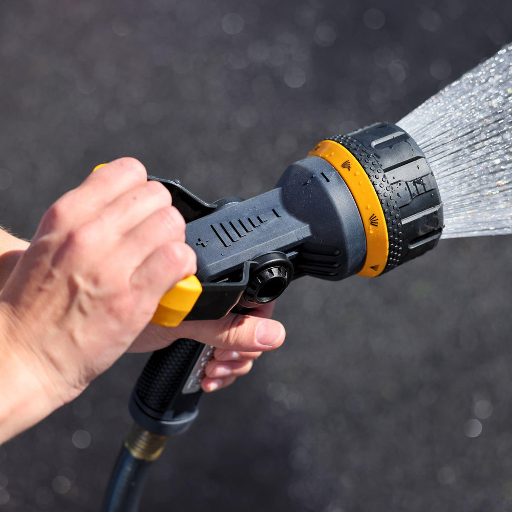 Melnor hose nozzle displayed with black and yellow colour scheme