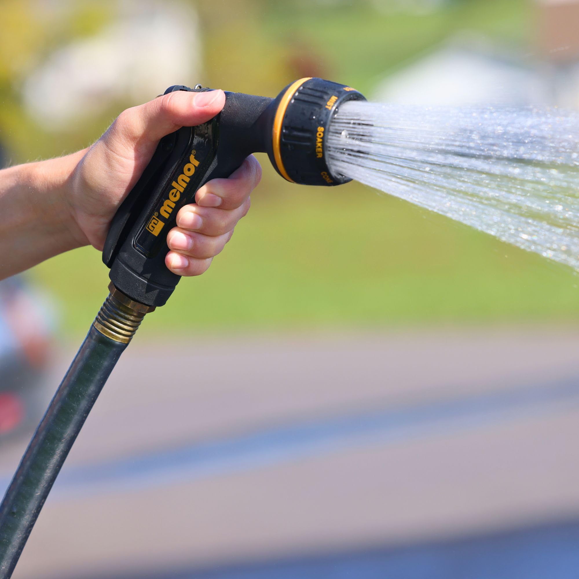 Melnor nozzle demonstrating powerful jet spray