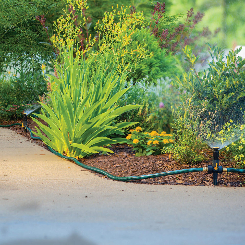 Melnor sprinklers demonstrating range of water coverage