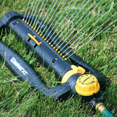 Melnor XT Turbo Oscillating Sprinkler in a garden setting
