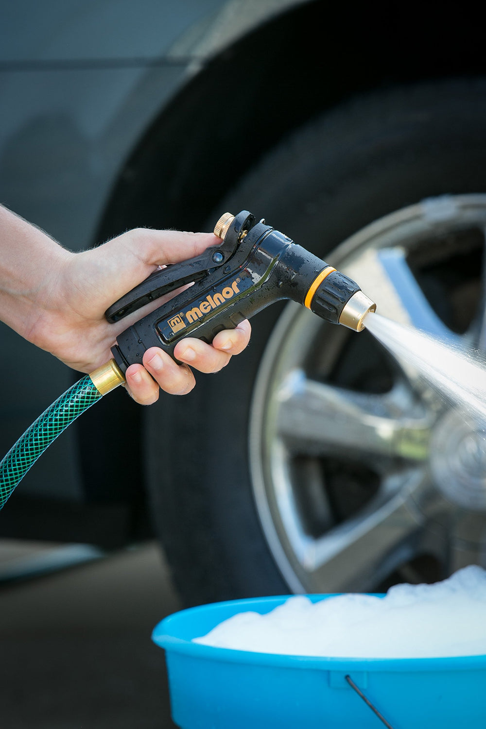 Melnor XT200 nozzle in use watering a garden