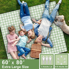 memKiya picnic blanket folded neatly in included nylon storage bag
