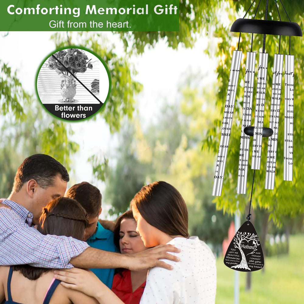 Memorial wind chimes hanging in a garden setting