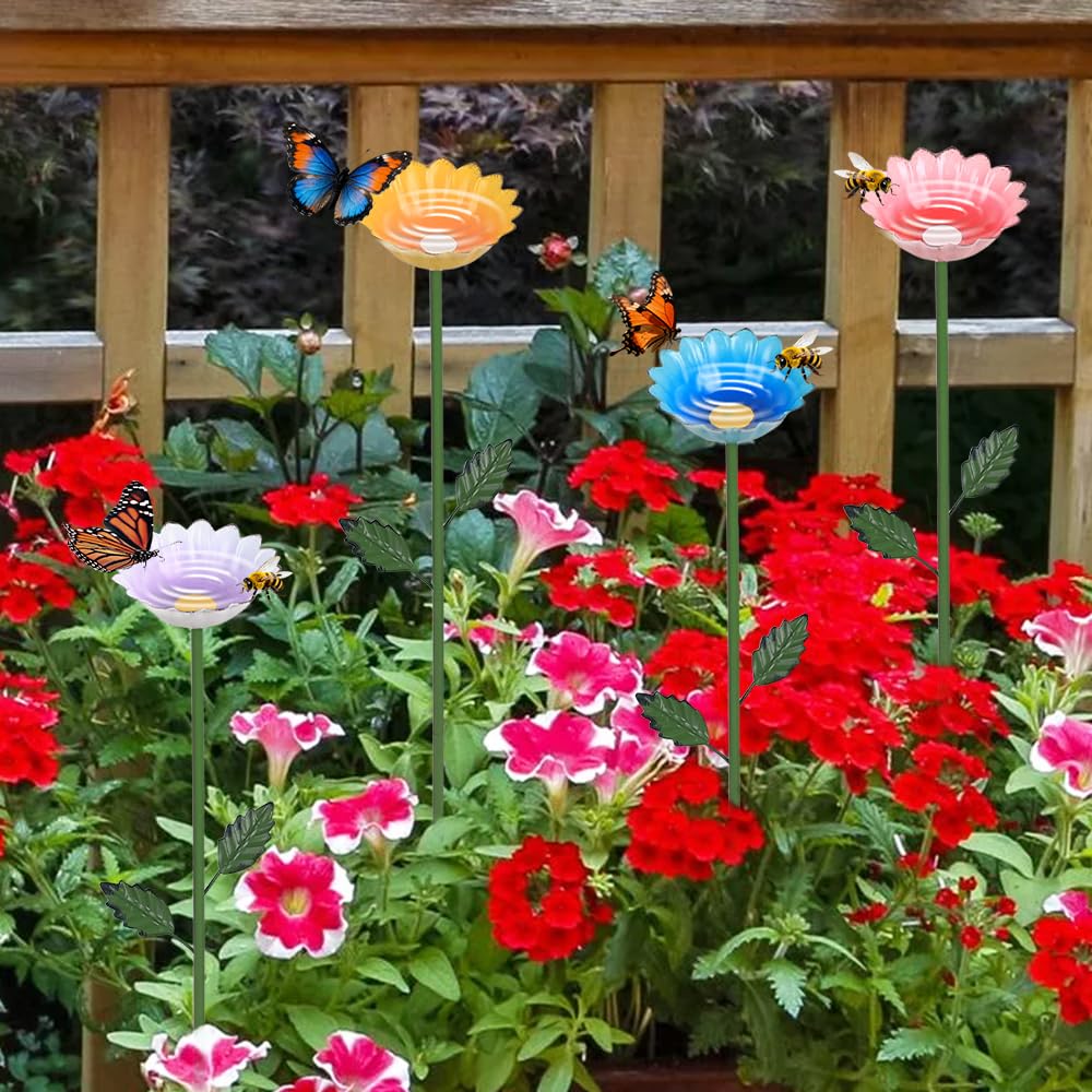 Metal bee watering stations with green stems