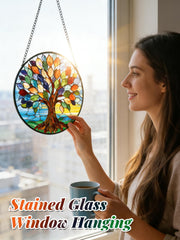 Meyocky Tree of Life suncatcher hanging in a sunny window