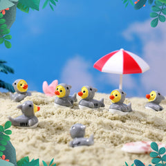 Mini shark ducks in a dollhouse scene