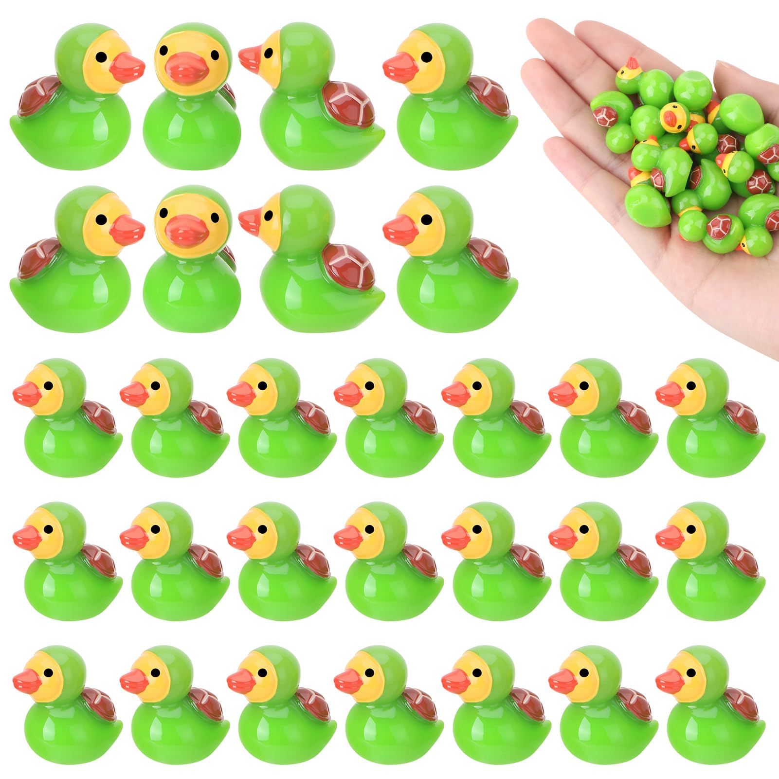 Mini turtle resin ducks in an aquarium setting