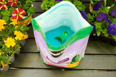 Miracle-Gro flower food powder in a measuring scoop