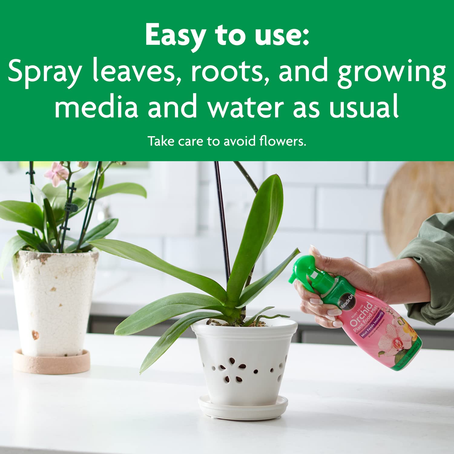 Miracle-Gro Orchid Plant Food Mist with orchid plants