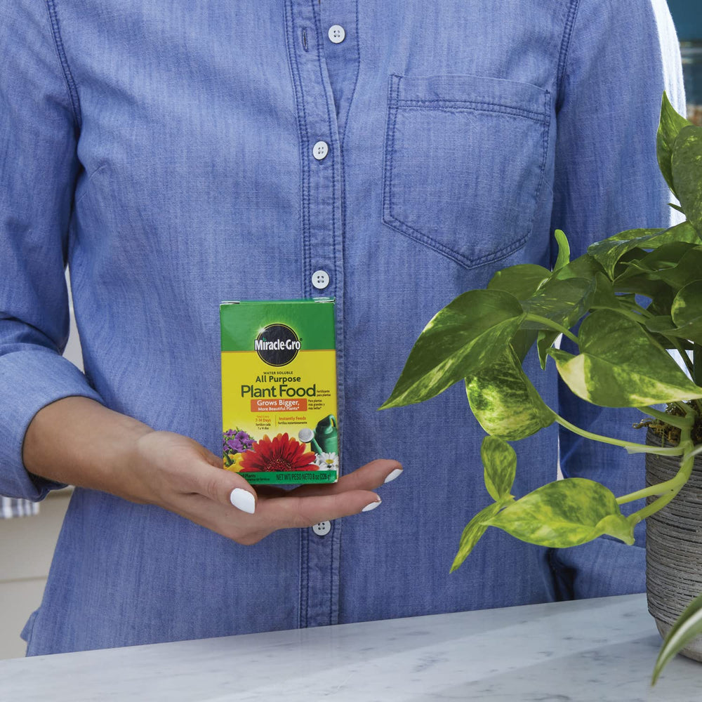 Miracle-Gro Plant Food bottle with measurement markings